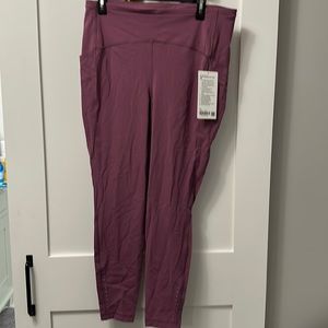 Lululemon sz 14swift speed HR tight 28” plum color
